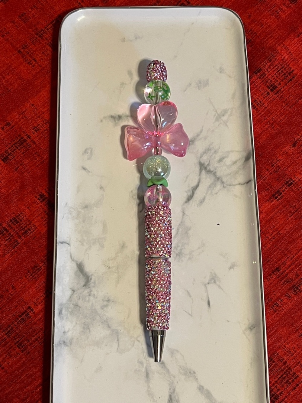 Extended rod Bling pen w fancy resin heart shape & bow shape beads.